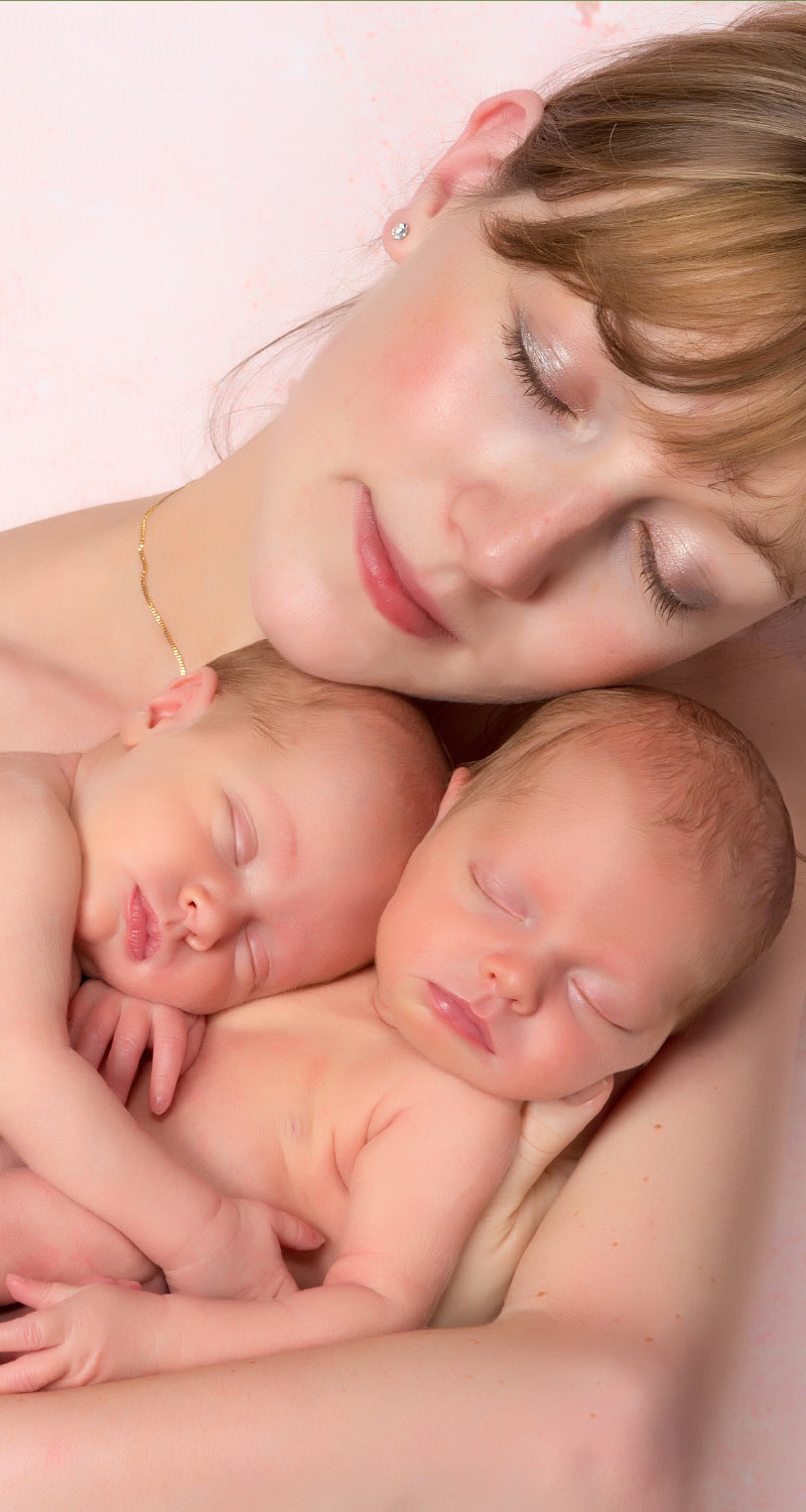 Mother Holding Twins