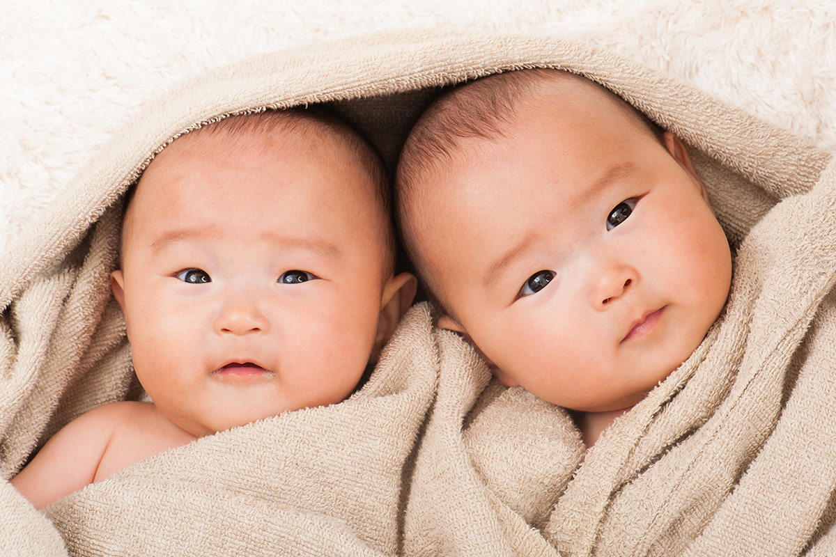 Twins Wrapped in a Towel