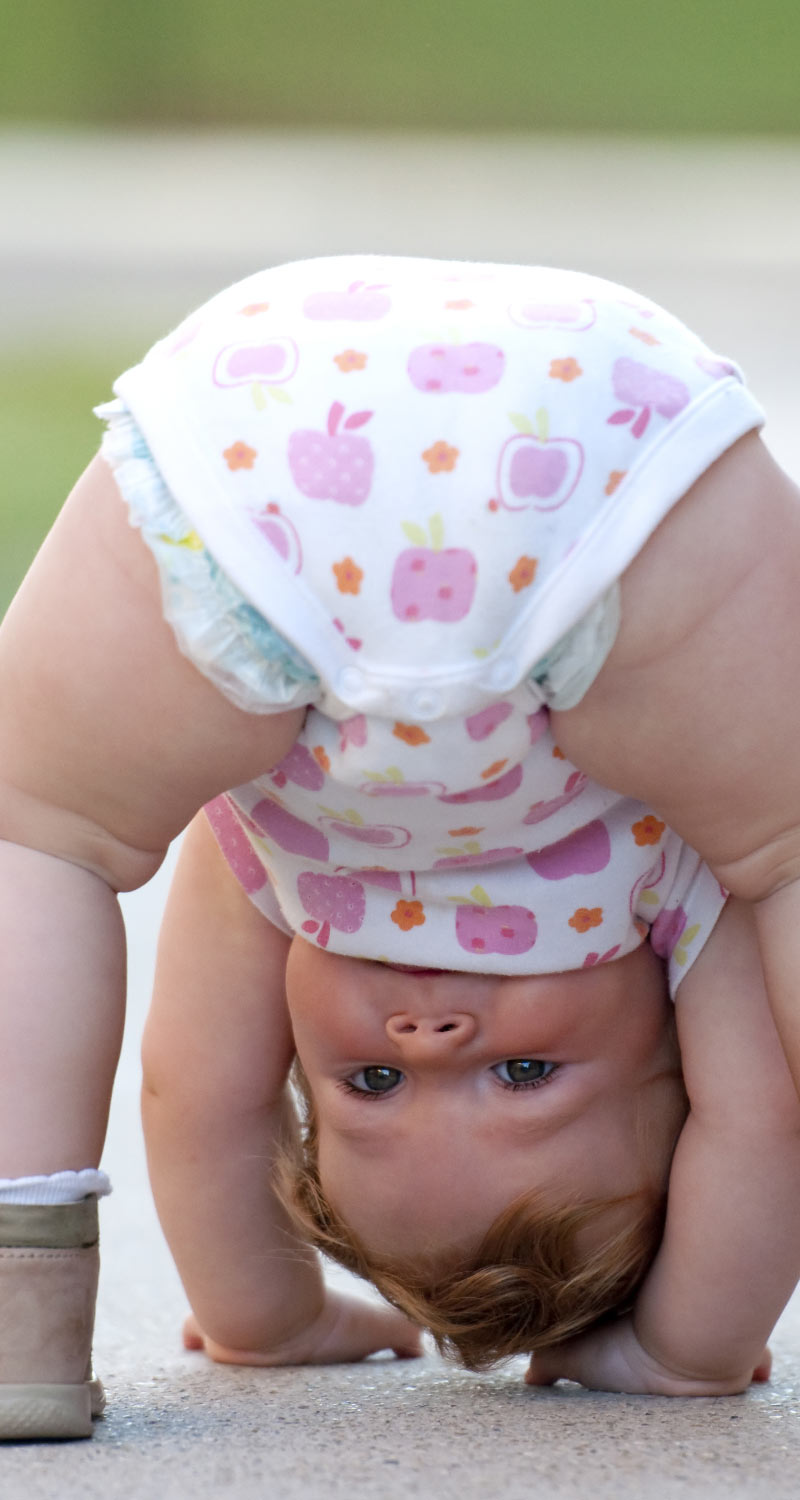 Baby Looking Through Legs